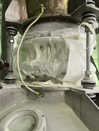 Clamped connector sucked in