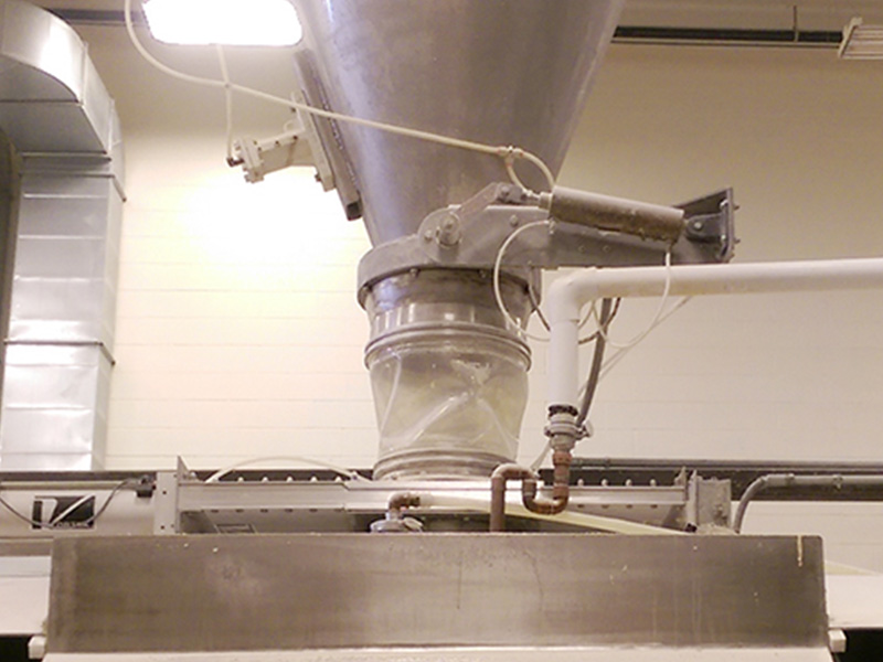BFM® used at bottom of silo to horizontal mixer in pizza crust manufacturing