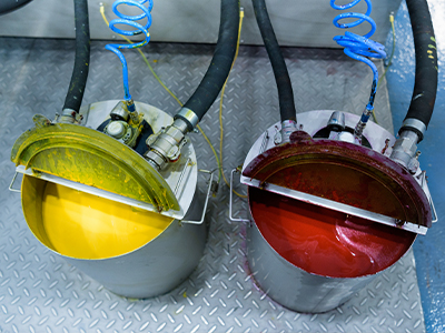 yellow and red paint being processed